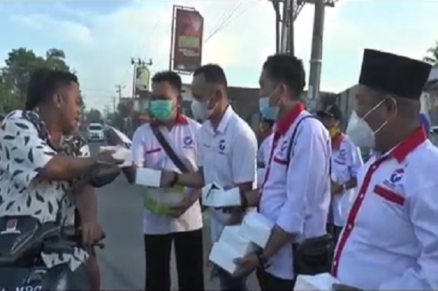  Perindo Deliserdang Bagikan Ratusan Takjil dan Masker sebagai Bentuk Kepedulian ke Masyarakat