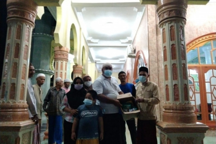 Perindo Secanggang Bantu Jamaah Masjid Jamik Nasrullah