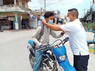 Jumat Berbagi, Partai Perindo Asahan Sebar Masker dan Nasi Kotak