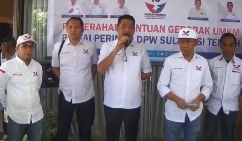 DPW Partai Perindo Sulteng Serahkan Bantuan Gerobak dan Modal ke Pedagang di Banggai 